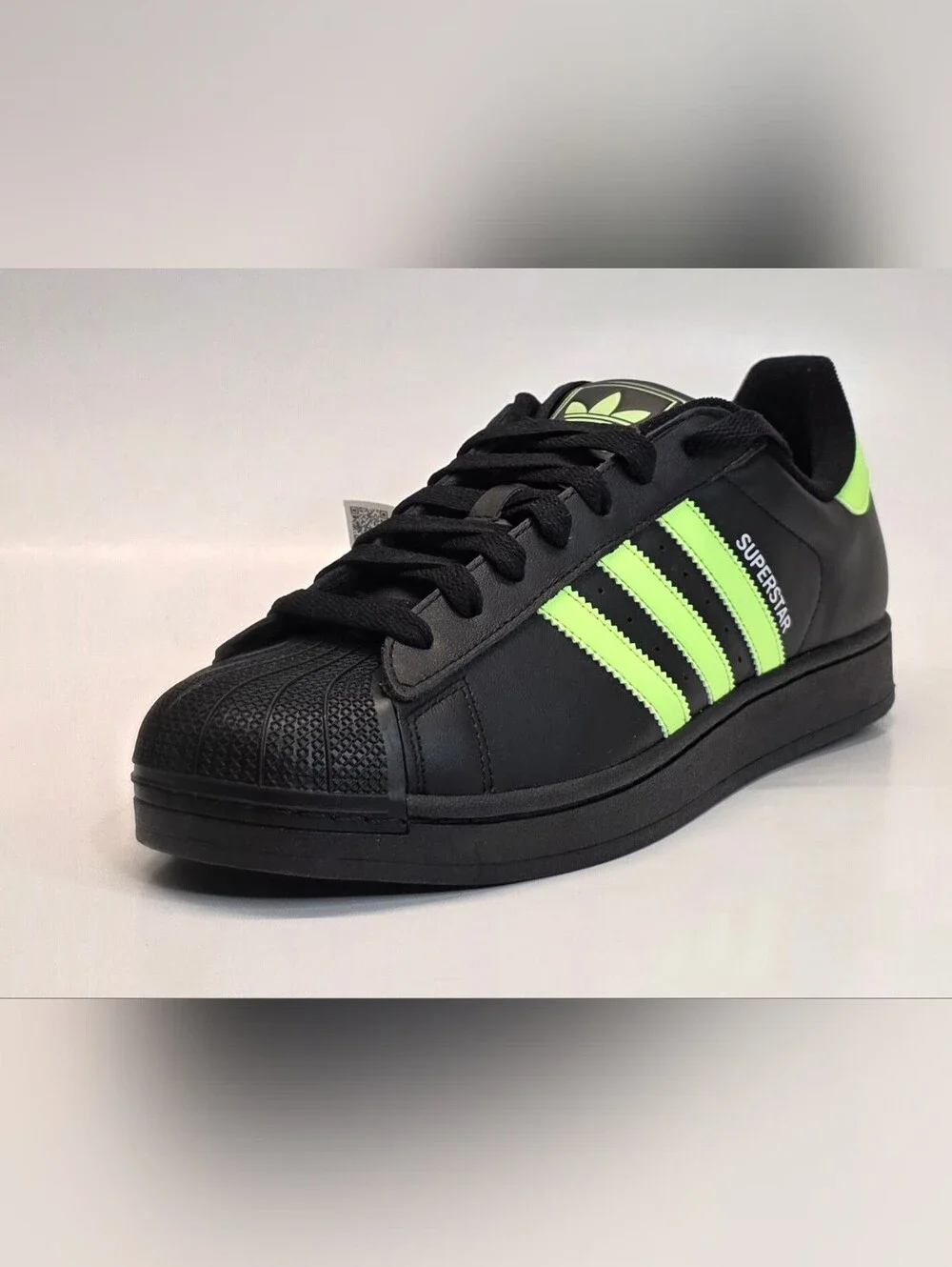 adidas Men’s Black Sneakers with Neon Green Stripes